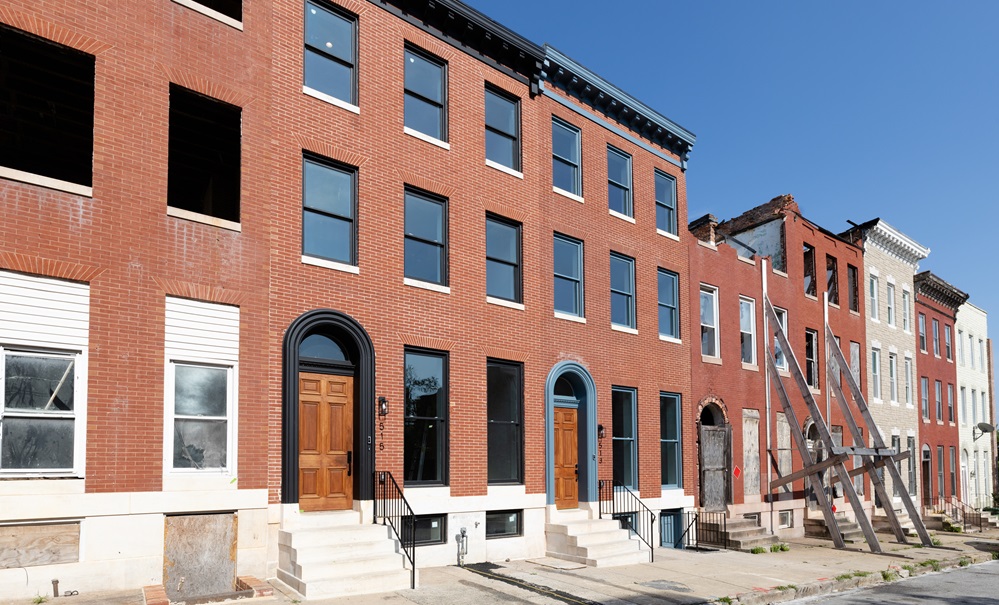 A row of homes in West Baltimore is being restored to its former glory, blending historic charm with modern touches.