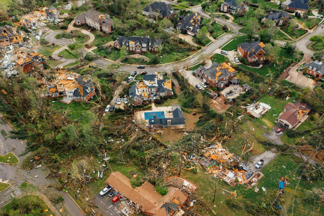 Overhead view of neighborhood with damage from a hurricane