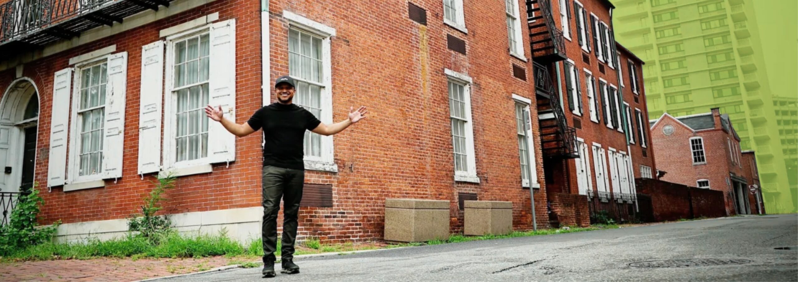 Equity Platforms CEO, Vernon Jay stands in front of the Front Street Lofts in historic downtown Harrisburg.